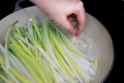 Add garlic to leeks