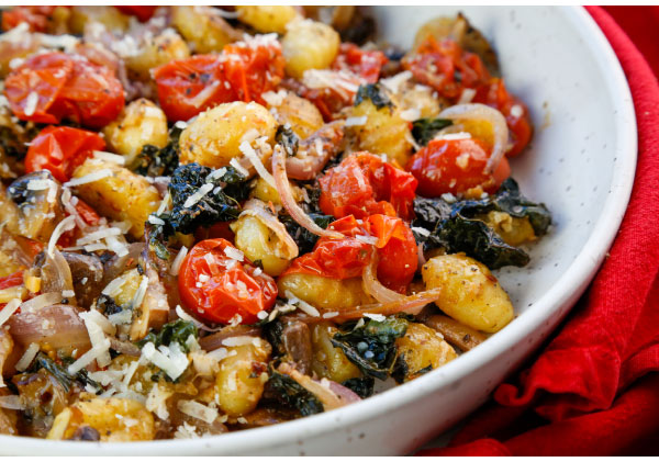 Crispy Sheet Pan Gnocchi with Tomatoes, Mushrooms, and Kale