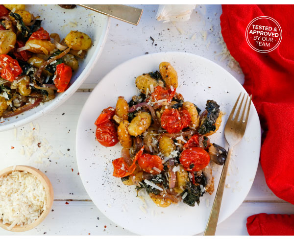 Crispy Sheet Pan Gnocchi with Tomatoes, Mushrooms, and Kale