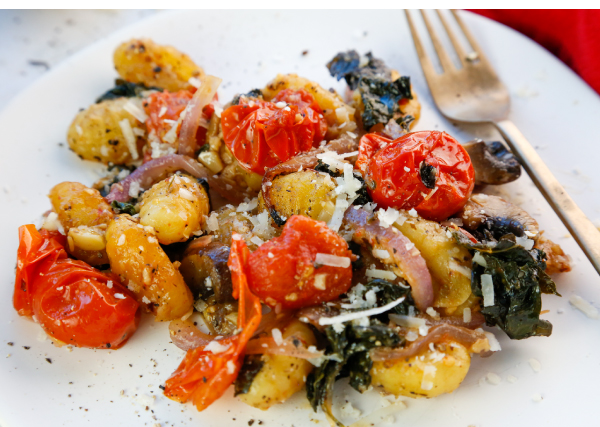 Crispy Sheet Pan Gnocchi with Tomatoes, Mushrooms, and Kale