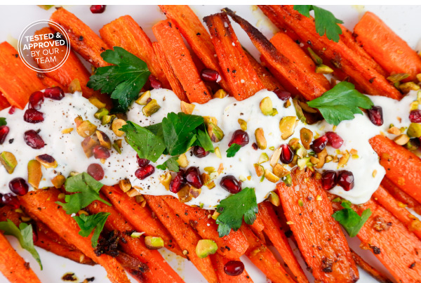 Roasted Carrots with Pistachios, Pomegranate, Parsley, and a Spicy Crema